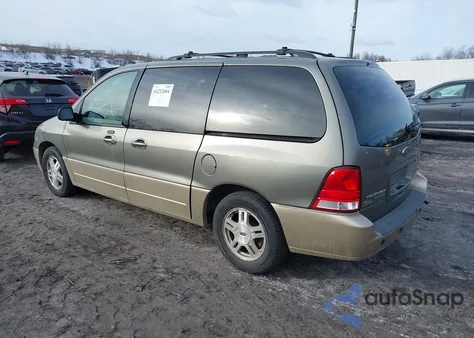 2004 Ford Freestar Limited из США, поврежденный, VIN 2FMDA58294BA83672